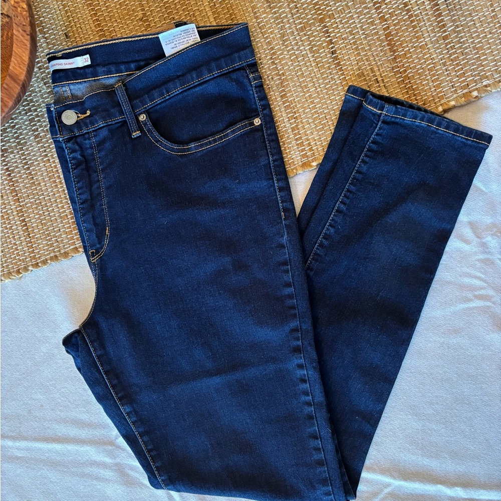 Levi’s 311 Shaping Skinny Dark blue jeans size 32” waist
New without tag.